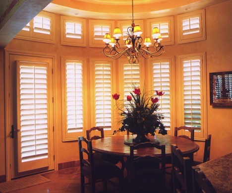 Plantation shutters on bow windows